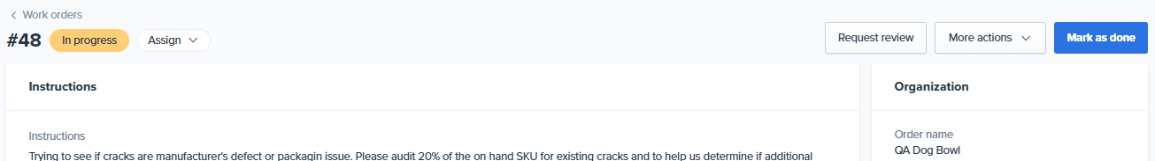 Top of the work order details page showing the work order ID, status pill, Priority drop-down, Request Review button, More actions menu, and Update status button